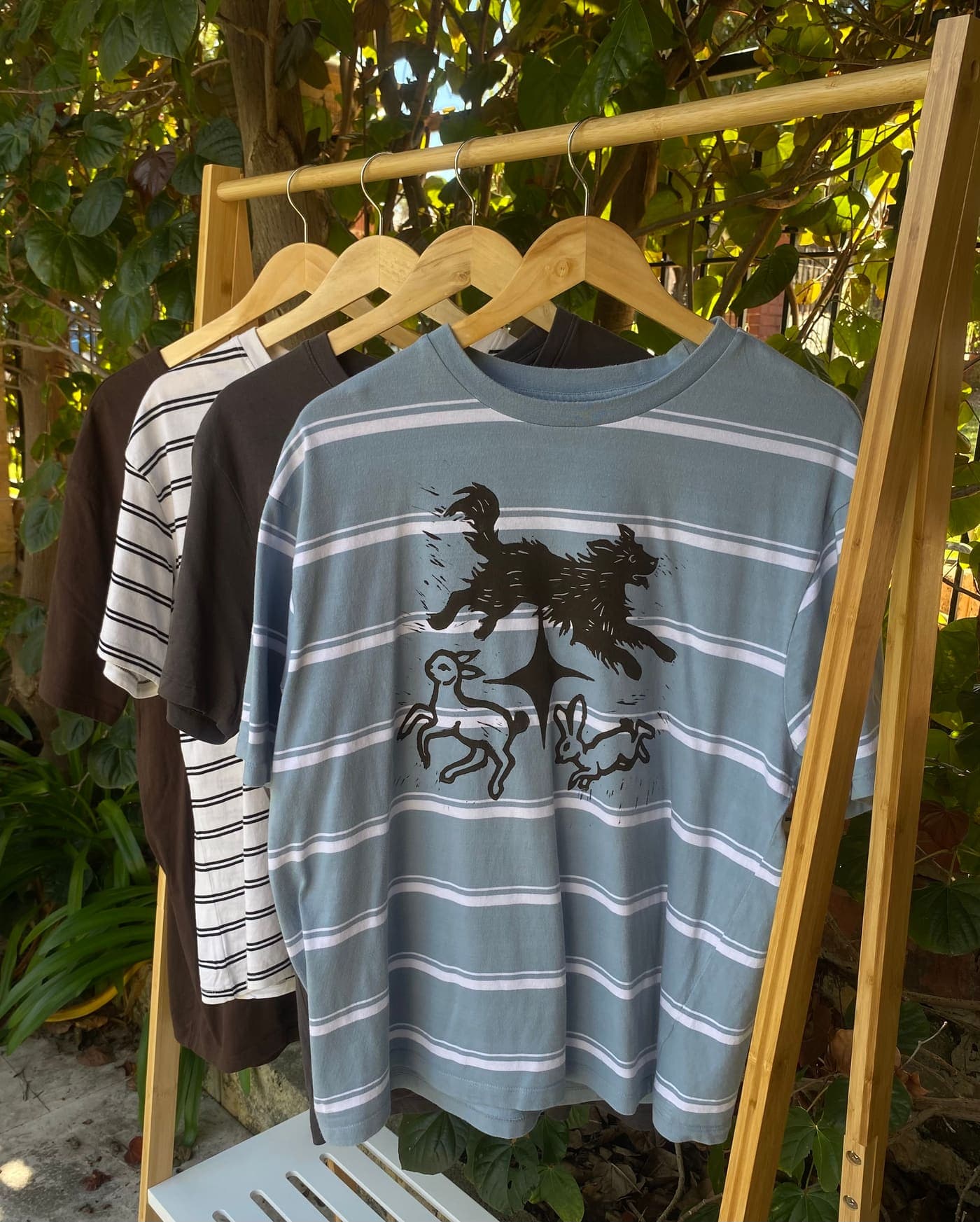 Hand lino-printed dog, lamb and hare on a striped tee